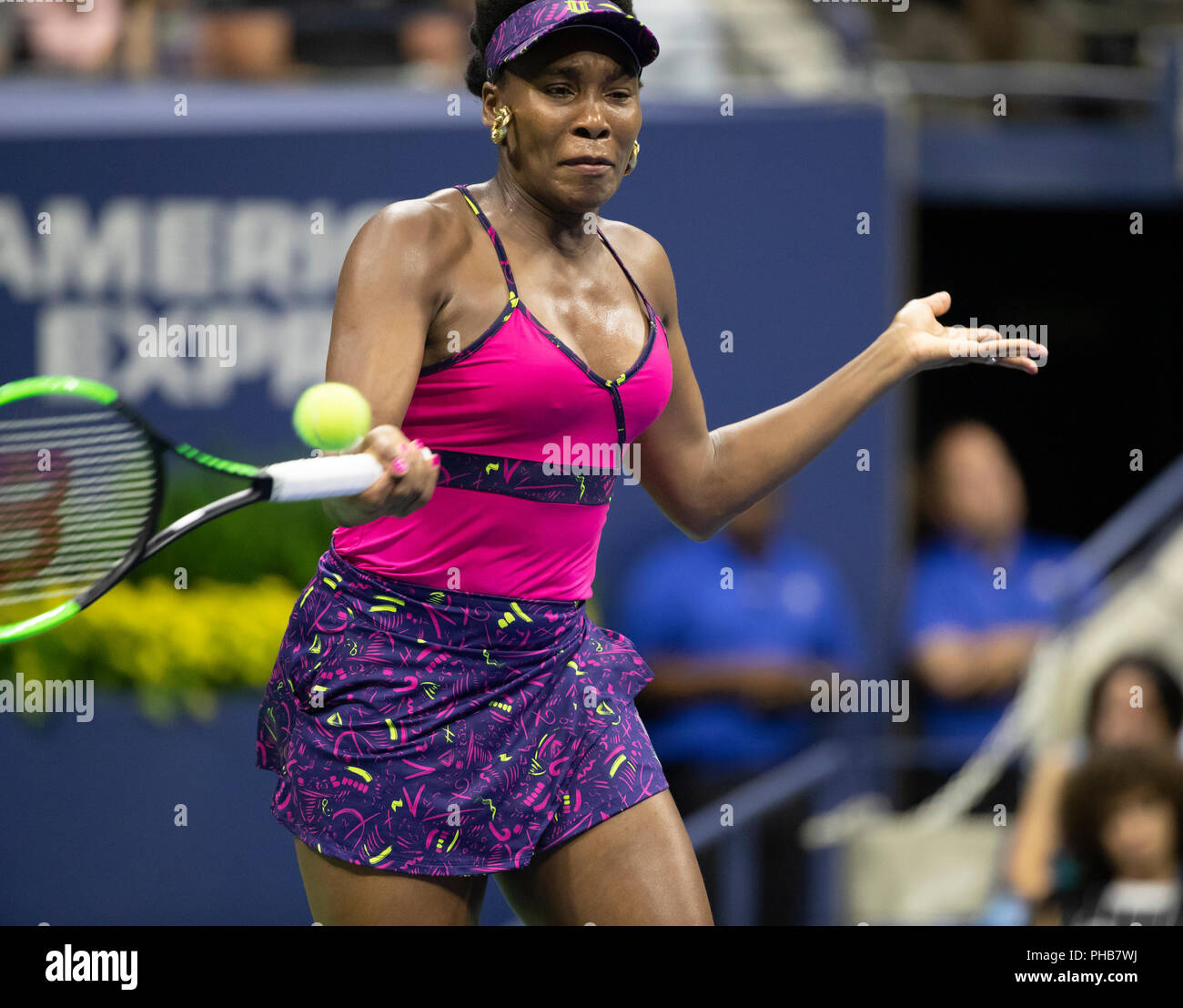 New York, NY - August 31, 2018: Venus Williams of USA returns ball during  US Open 2018 3rd round match against Serena Williams of USA at USTA Billie  Jean King National Tennis