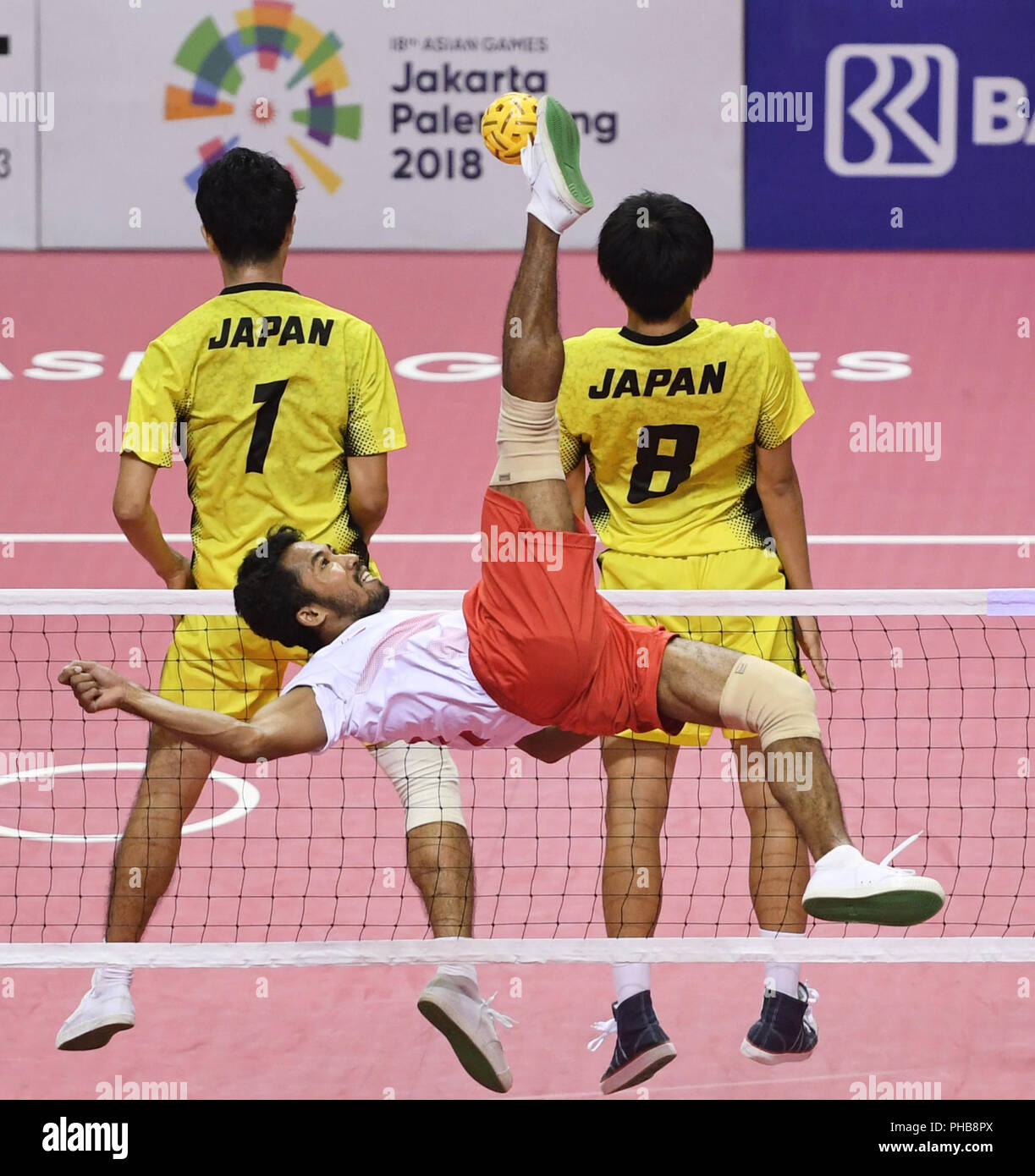 (180901) --PALEMBANG, Sept. 1, 2018 (Xinhua) -- Saiful Rijal of Indonesia competes during Sepaktakraw Men's Quadrant Gold Medal Match between Indonesia and Japan in Palembang, Indonesia Sept. 1, 2018. Indonesia won 2-1. (Xinhua/Liu Ailun) Stock Photo