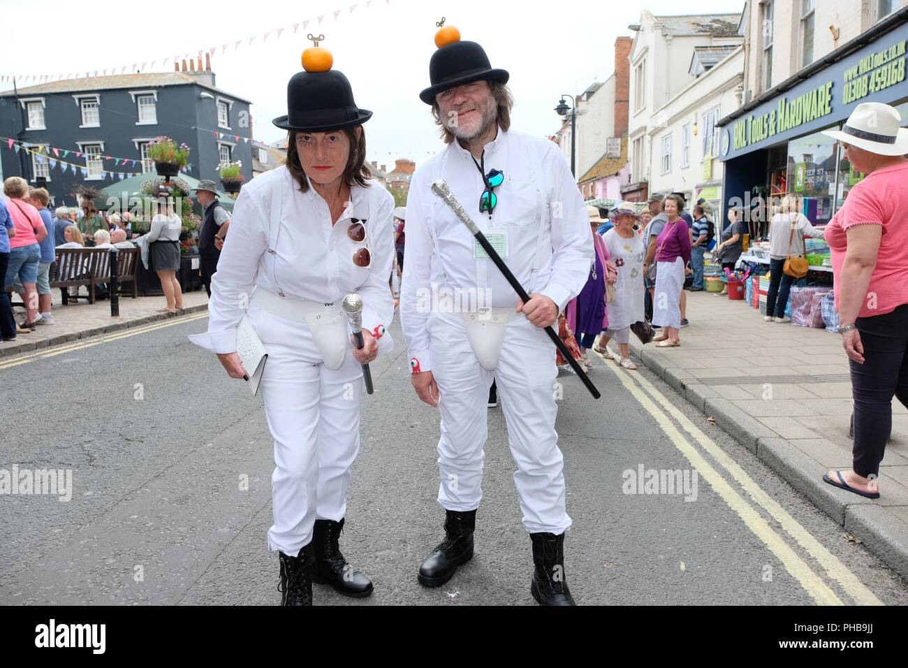Bridport Hat Festival, Hat, Bridport, Dorset, UK. 1st September 2018.   Hat wearers gather and promenade in Bridport. The annual Bridport Hat Festival encourages residents and visitors to take part in hat related activities and and competitions including best hats, best hatted dog, and best hatted couple and most elegant ensemble. Credit:  Tom Corban/Alamy Live News Stock Photo