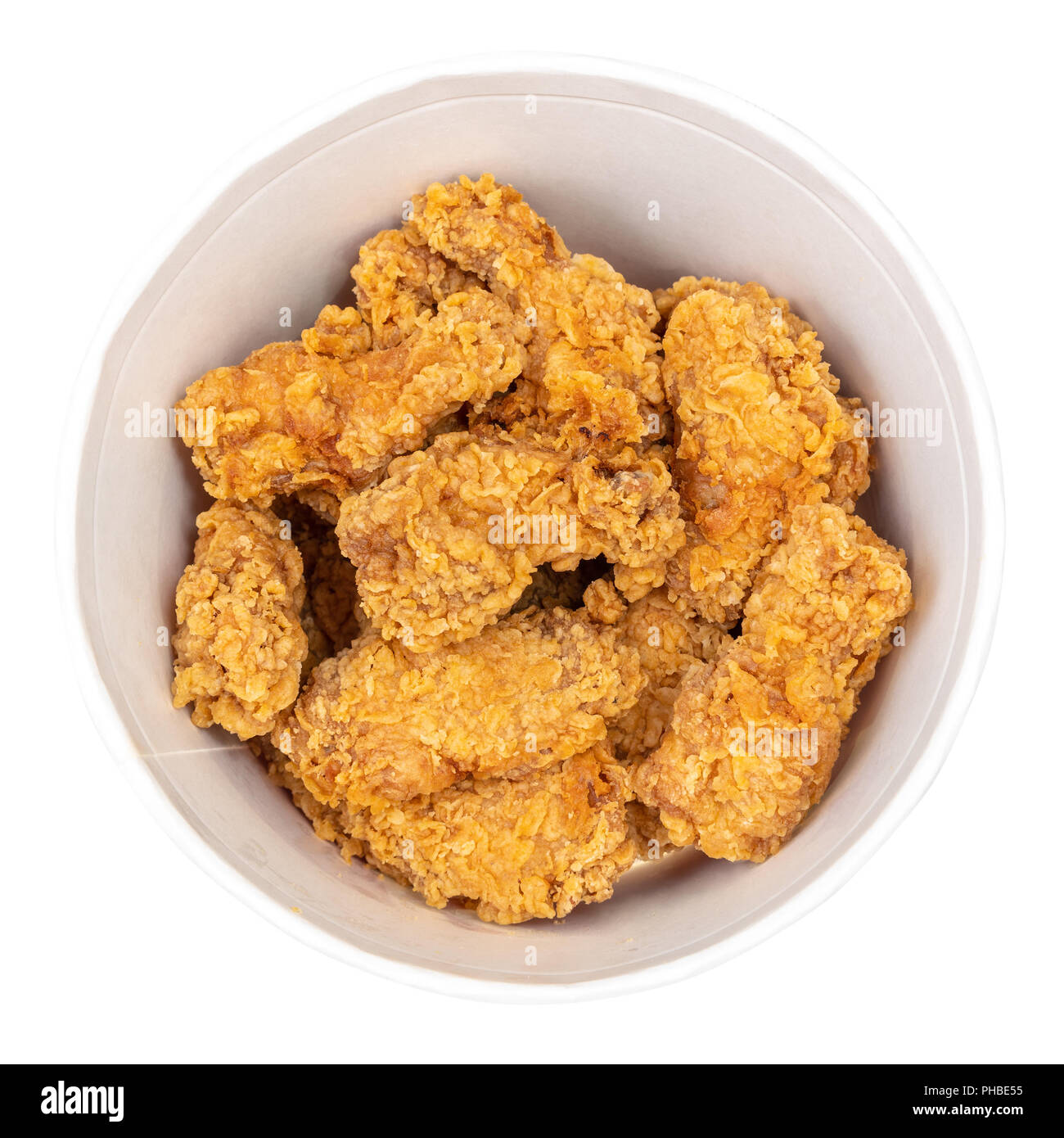 top view of bucket with roasted spicy chicken wings cut out on white Stock Photo