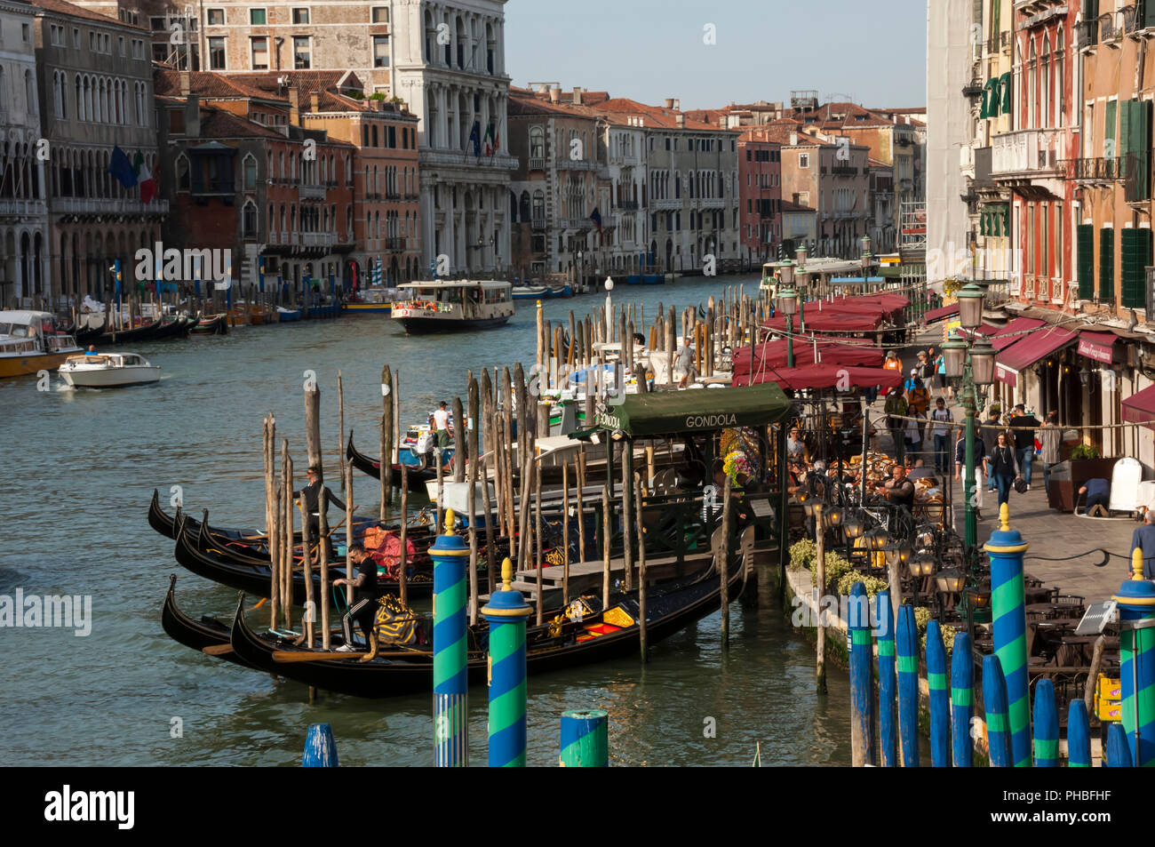 Gondola moorings near Rialto Bridge, Grand Canal, Venice, UNESCO World Heritage Site, Veneto, Italy, Europe Stock Photo