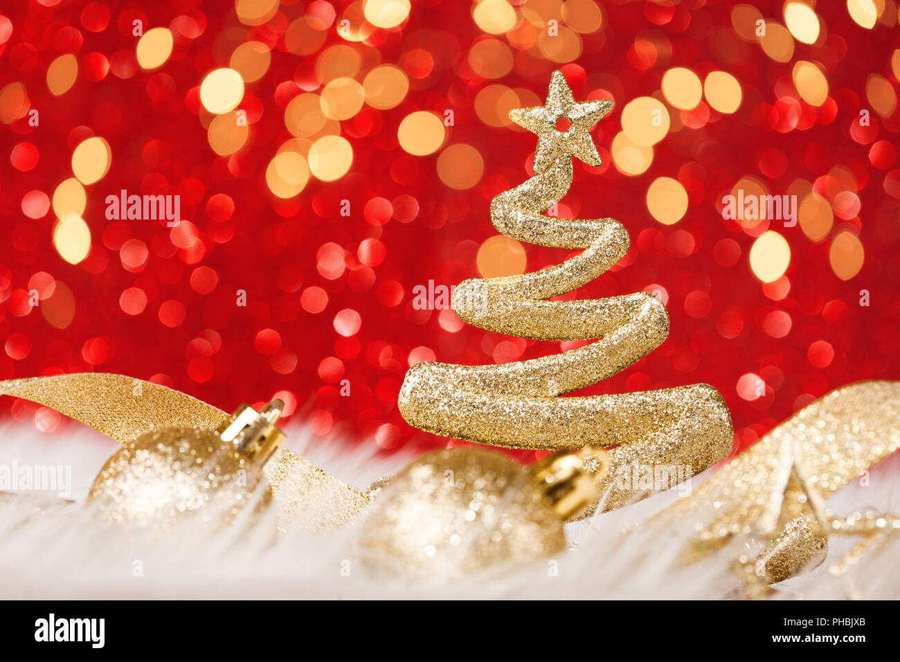 Shining Christmas tree with golden star and circle bokeh or glitter ...