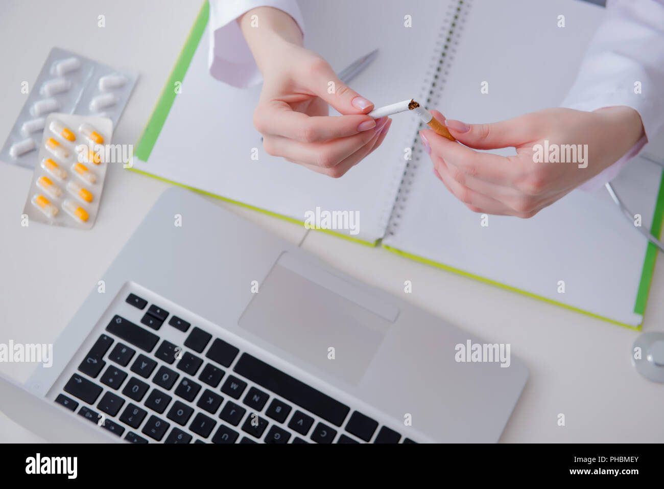 Doctor in anti smoking concept Stock Photo - Alamy