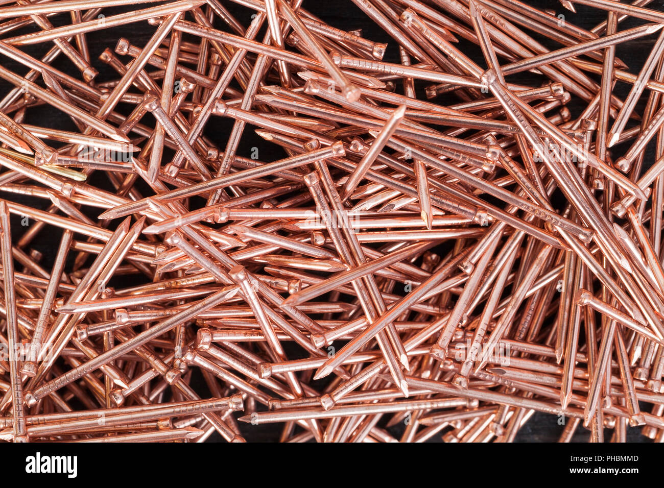 a pile of small metal nails made or processed with copper for finishing work with wood, closeup Stock Photo - Alamy a pile of small metal nails made or processed with copper for finishing work with wood, closeup Stock Photo - Alamy