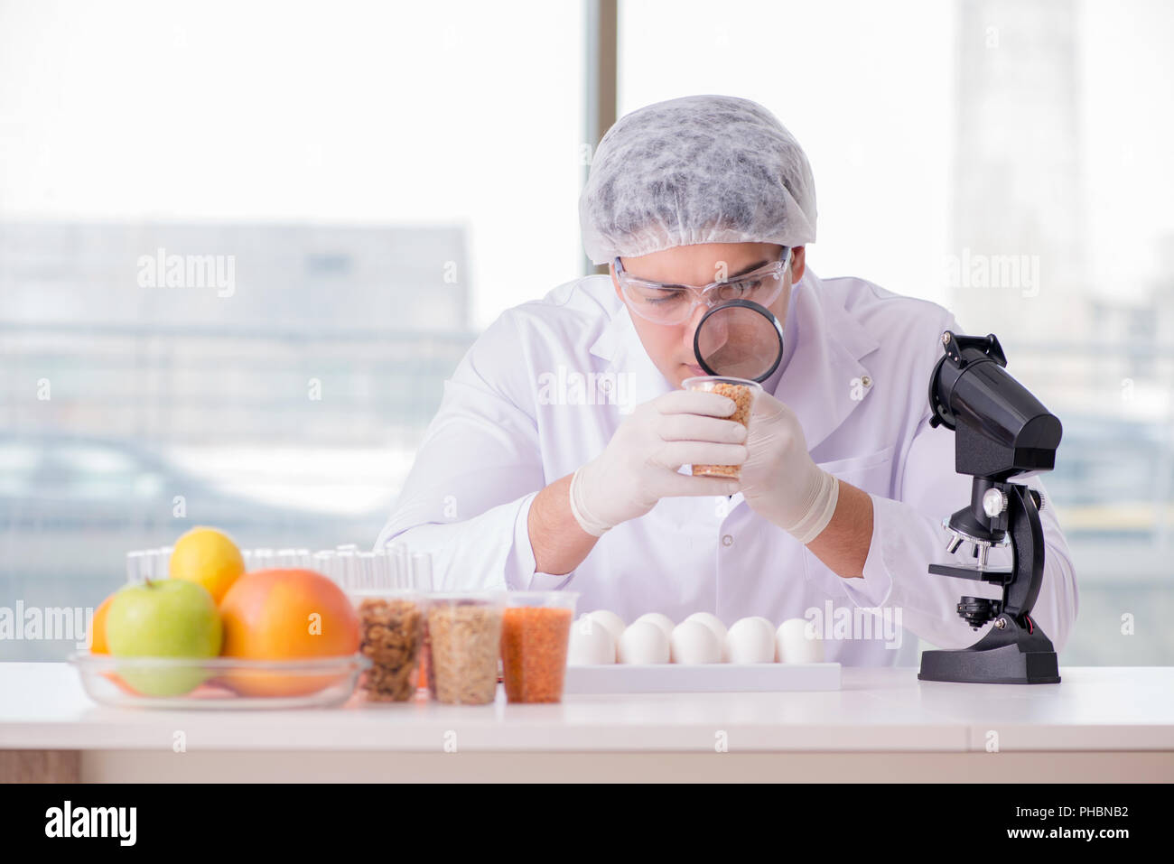 Nutrition expert testing food products in lab Stock Photo Alamy
