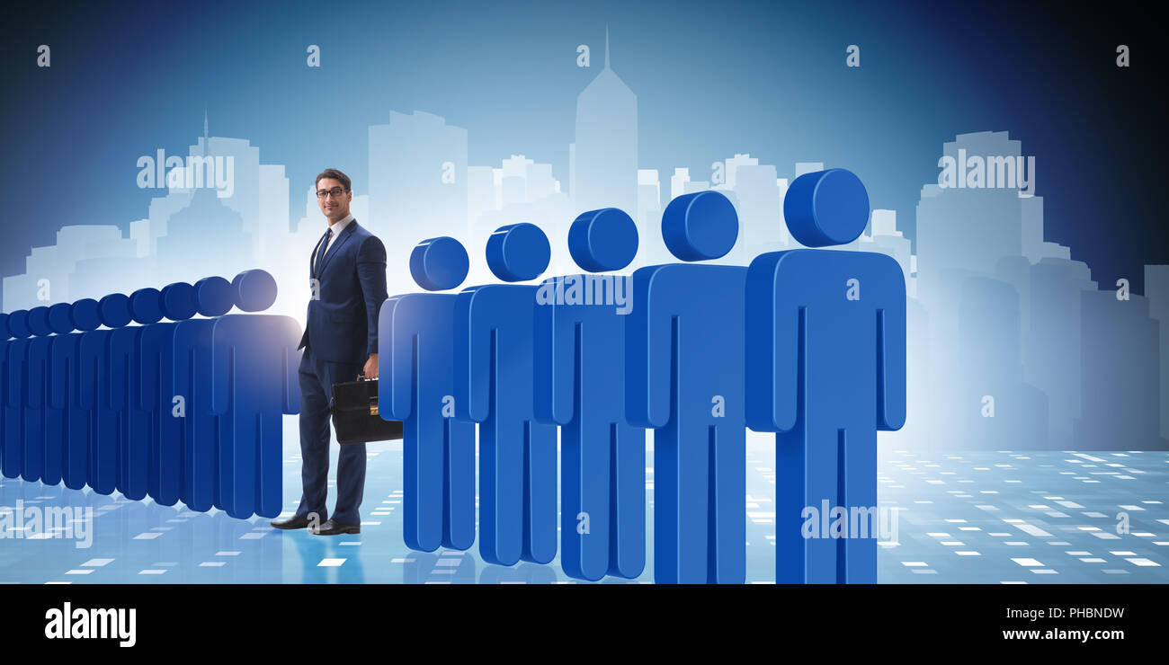 Standing out from crowd concept with businessman Stock Photo