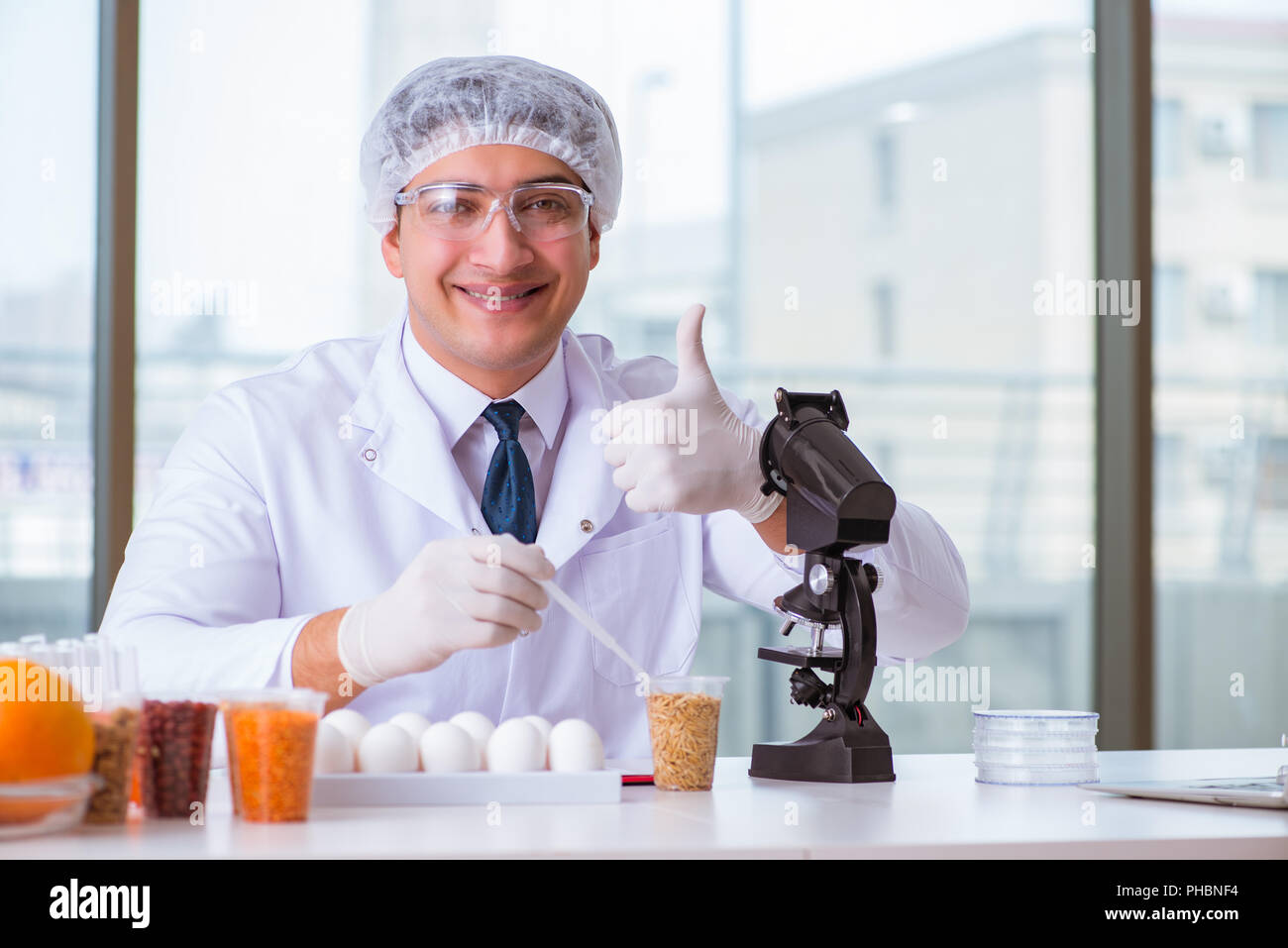 Nutrition expert testing food products in lab Stock Photo Alamy