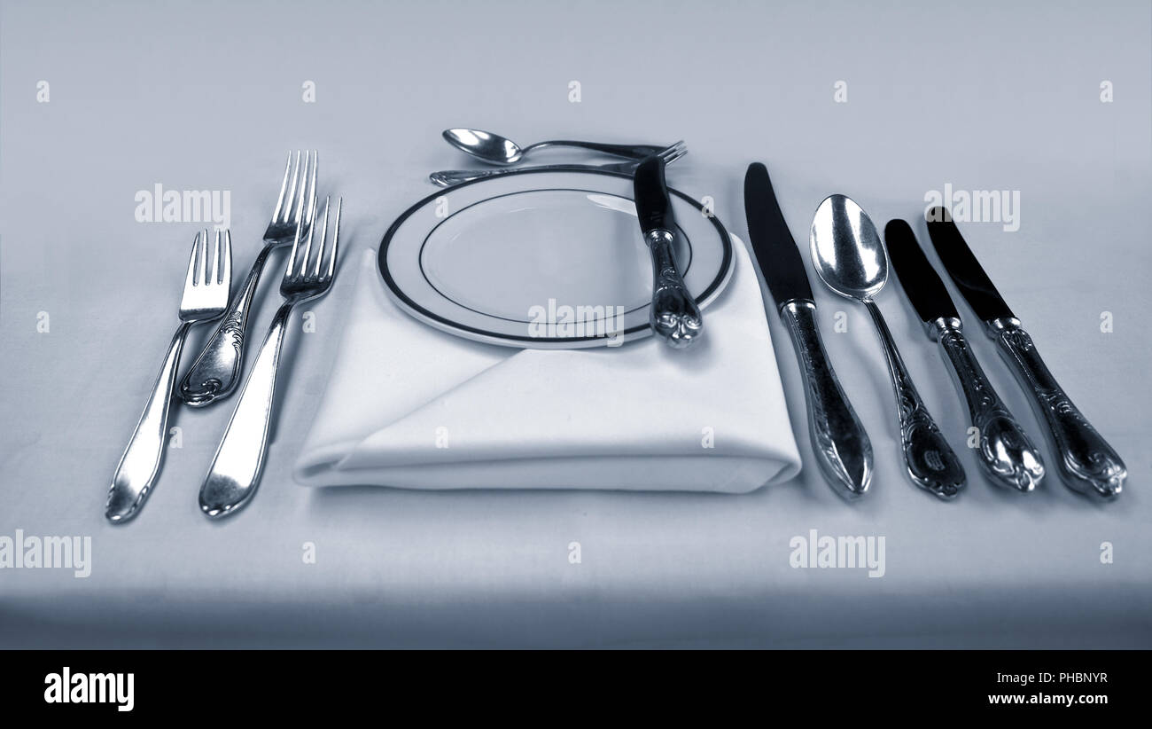 Cutlery, laid table Stock Photo