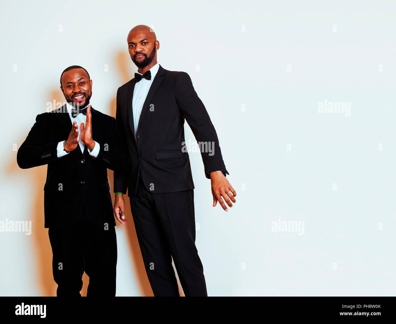 two afro-american businessmen in black suits emotional posing, g Stock ...