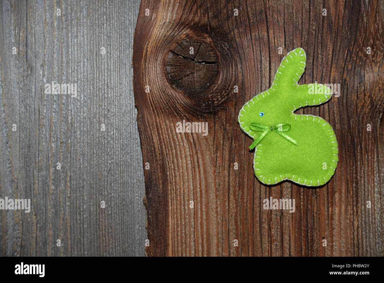 Easter bunny on wood background Stock Photo