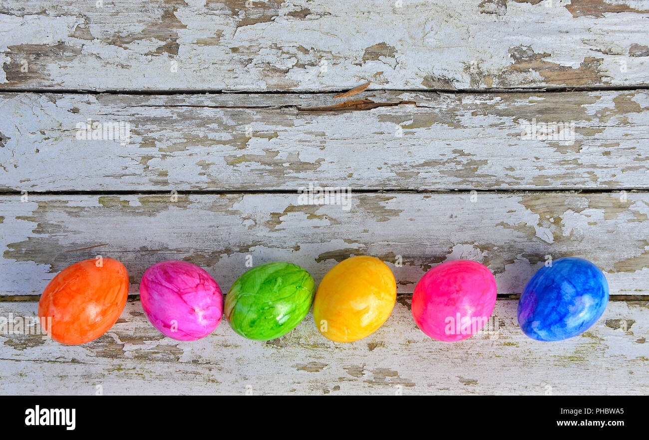 easter eggs on old white wood background Stock Photo