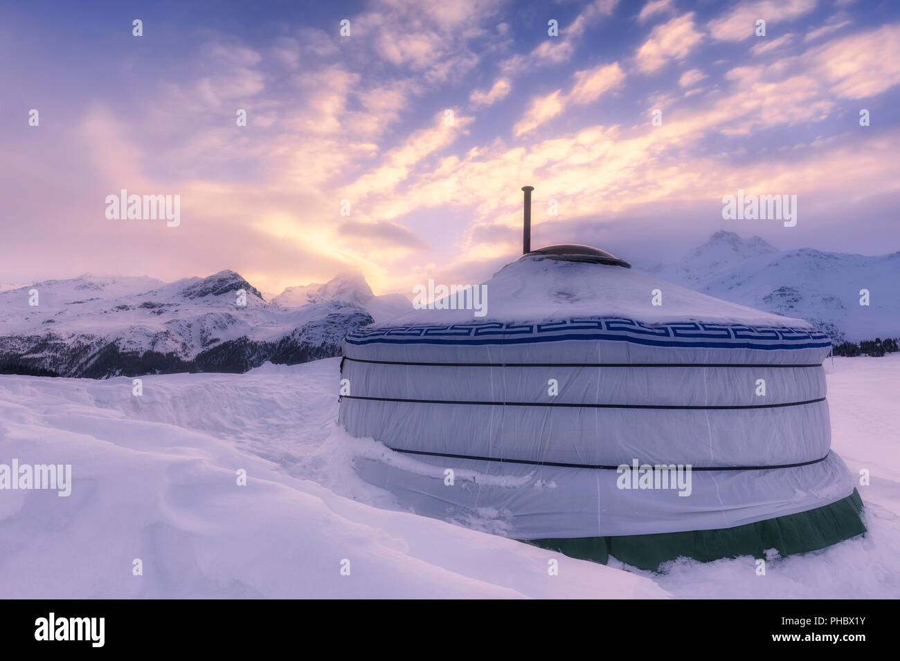 Winter sunset at Mongolian tent at Alp Flix, Sur, Surses, Parc Ela, Region of Albula, Canton of Graubunden, Switzerland, Europe Stock Photo