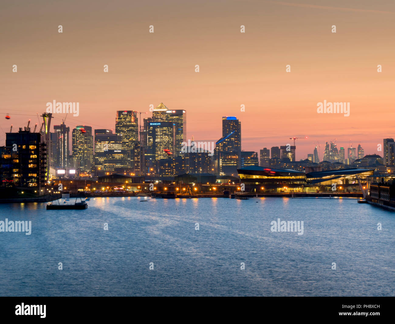 Canary Wharf and City Square Mile cityscape from Royal Victoria dock, Docklands, London, England, United Kingdom, Europe Stock Photo