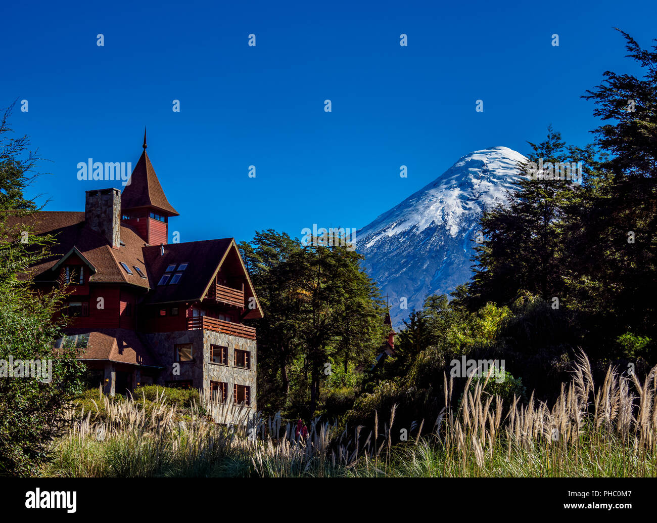 Petrohue Lodge and Osorno Volcano, Petrohue, Llanquihue Province, Los Lagos Region, Chile, South America Stock Photo