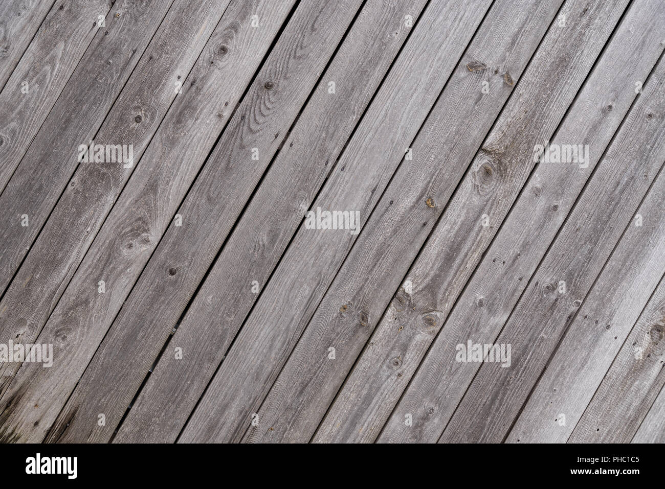 Oblique weathered old plank wall - copy-space Stock Photo