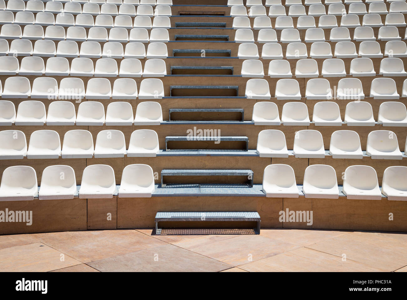 Rows of plastic seats Stock Photo