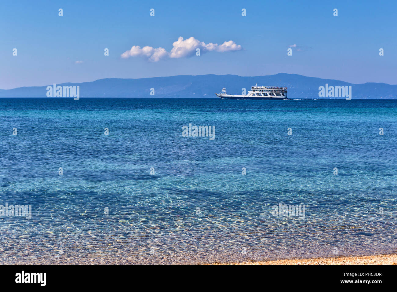 Ship in Aegean sea, Ouranoupoli, Central Macedonia, Chalkidiki, Greece Stock Photo