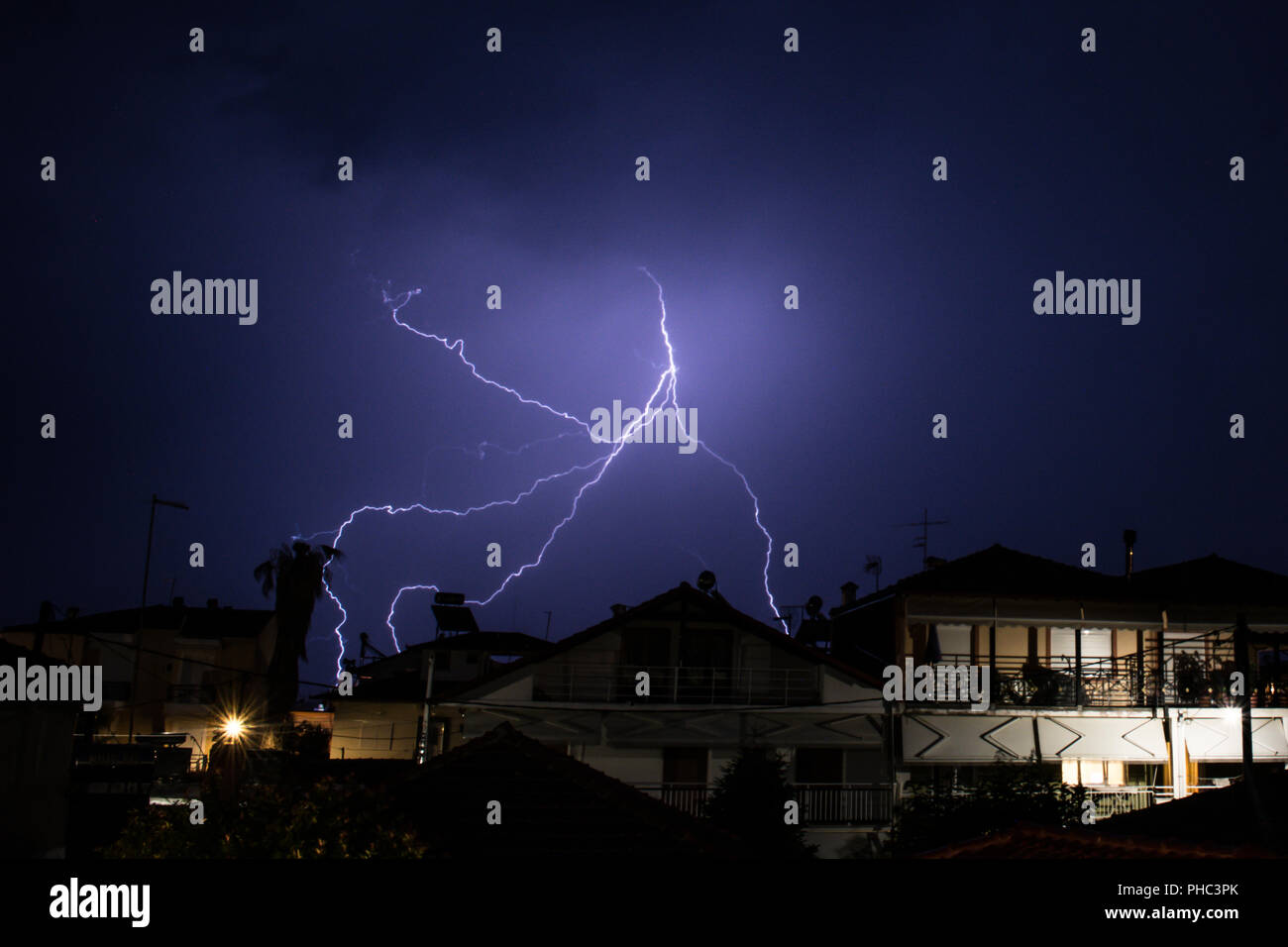 Bolt of lightning striking house hires stock photography and images