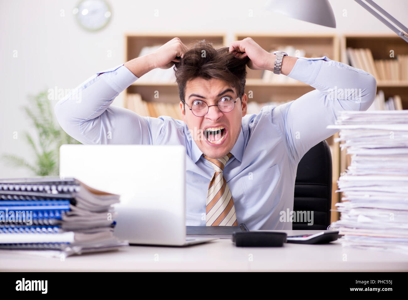 Funny accountant bookkeeper working in the office Stock Photo - Alamy