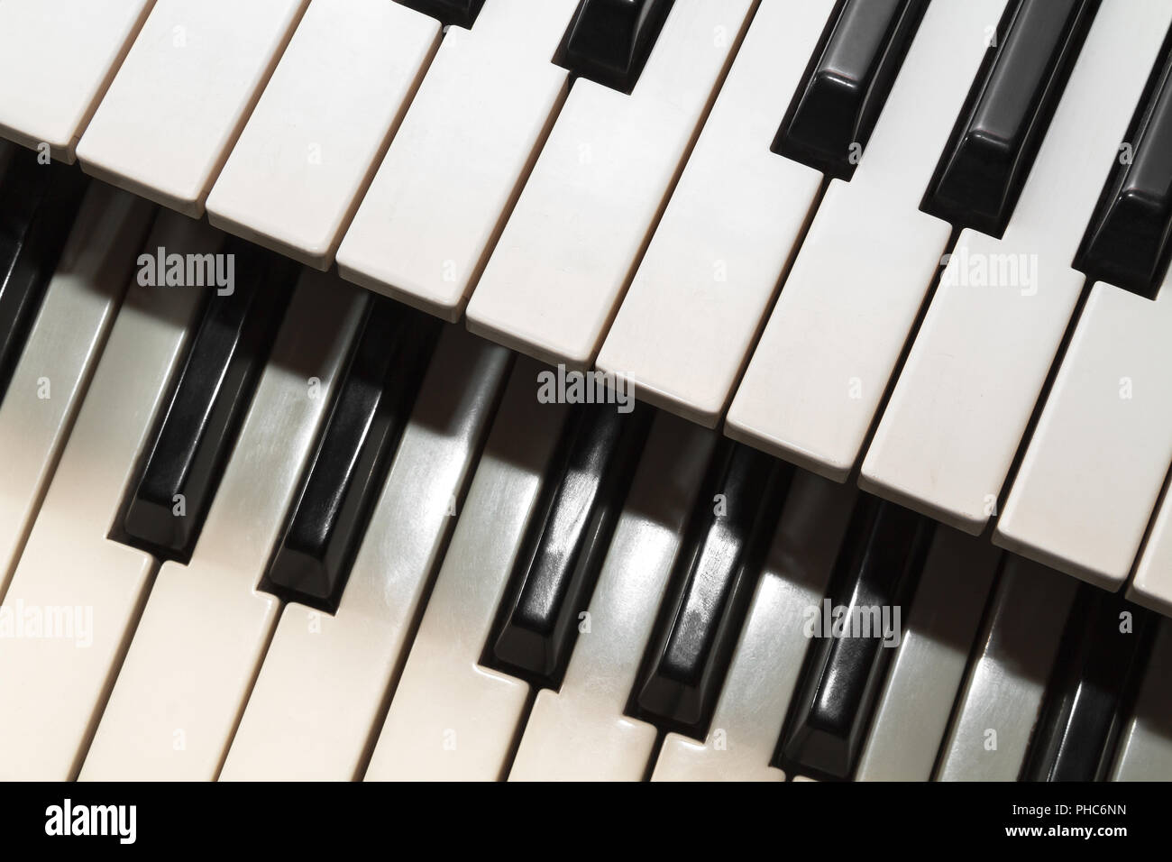 Two musical keyboards Stock Photo