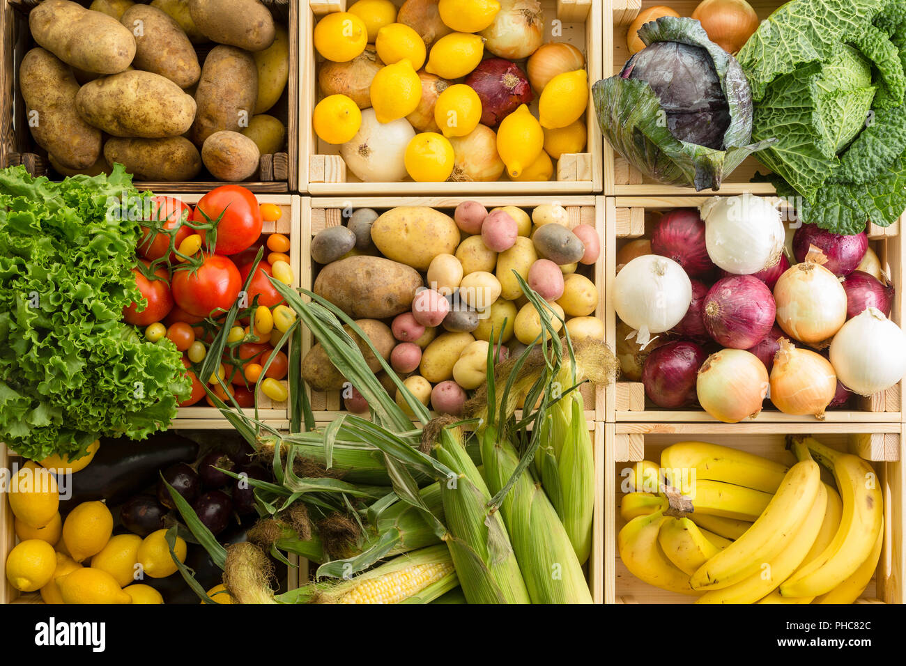 View from above nine rectangular wood boxes filled with assorted ...
