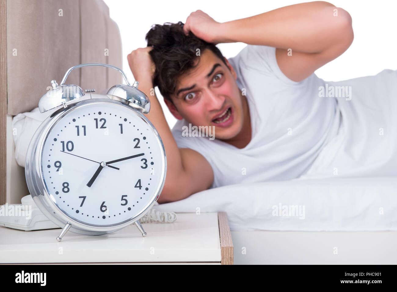 The man in bed suffering from insomnia Stock Photo