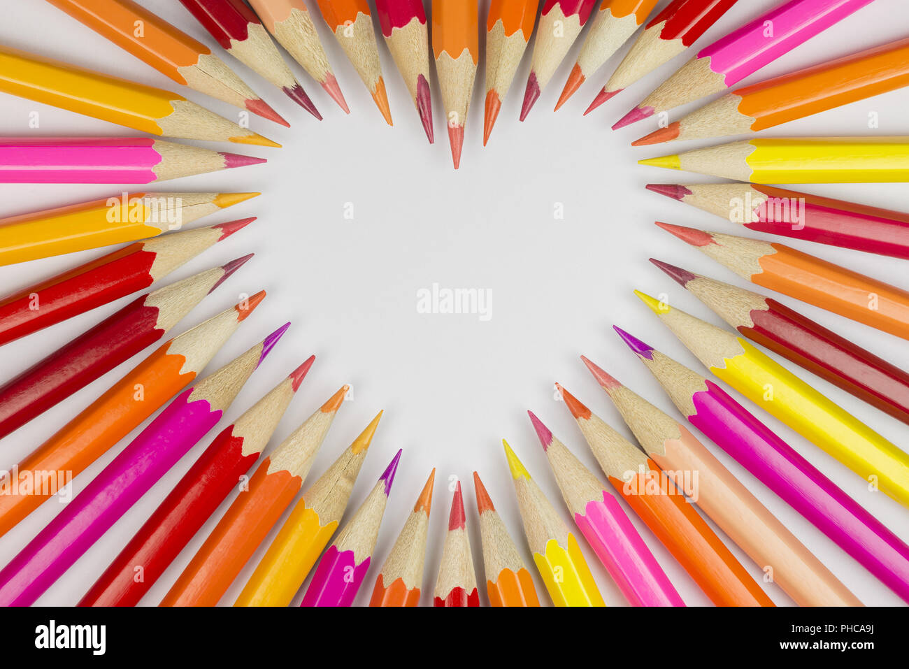 Wooden crayons as background picture Stock Photo - Alamy