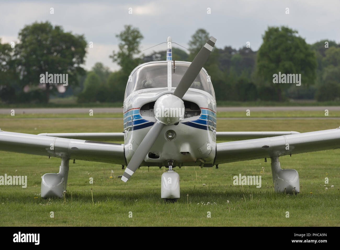 Front view of a plane on a lawn Stock Photo