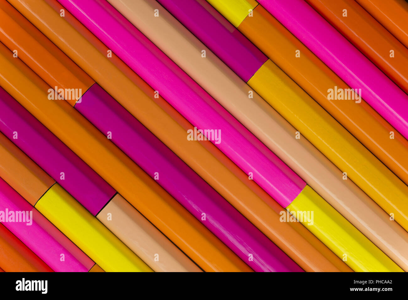 Wooden crayons as background picture Stock Photo - Alamy