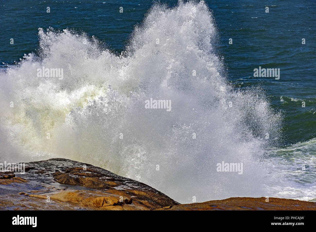 Big seawater spray Stock Photo