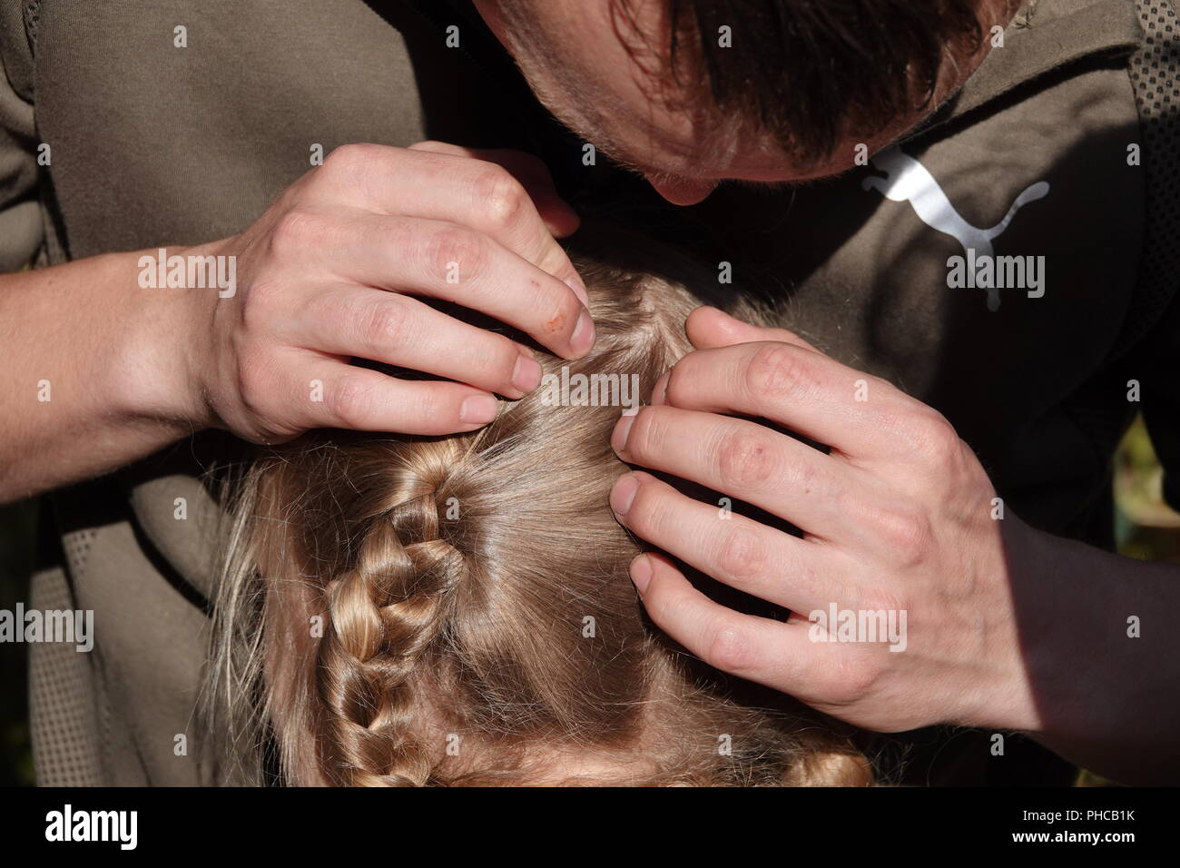 Head Lice Infection Common In Young People Hair Being Checked