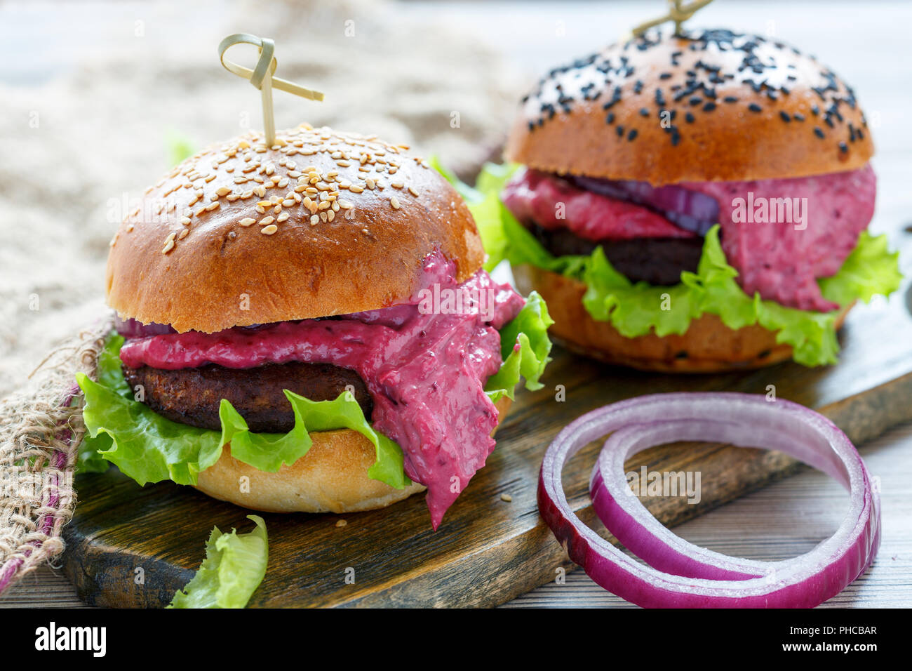 Homemade burger with berry sauce. Stock Photo