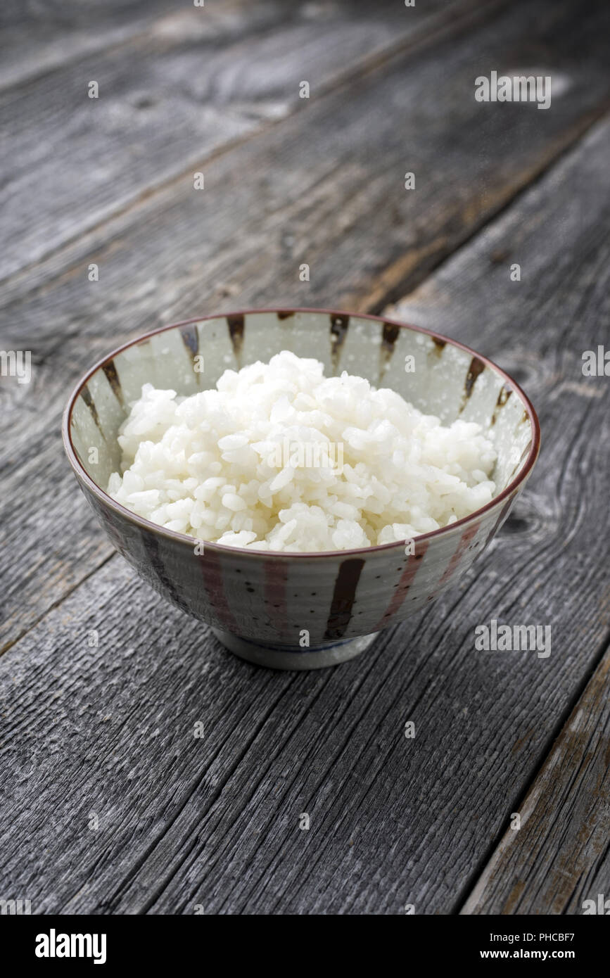 Traditional Japanese Koshihikari Rice as close-up in a bowl Stock Photo ...