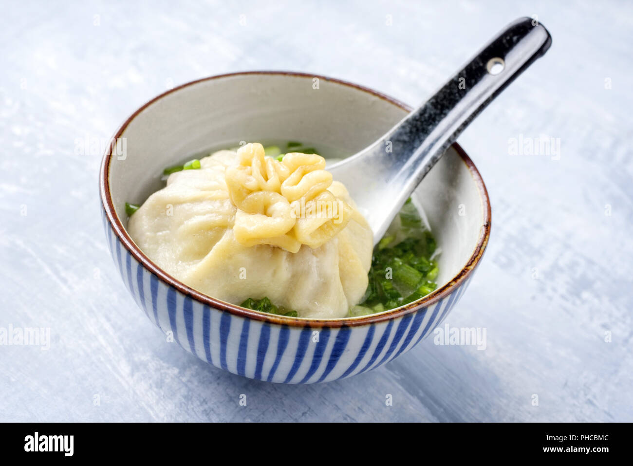 Traditional Caucasien Manti as close-up on a bowl Stock Photo