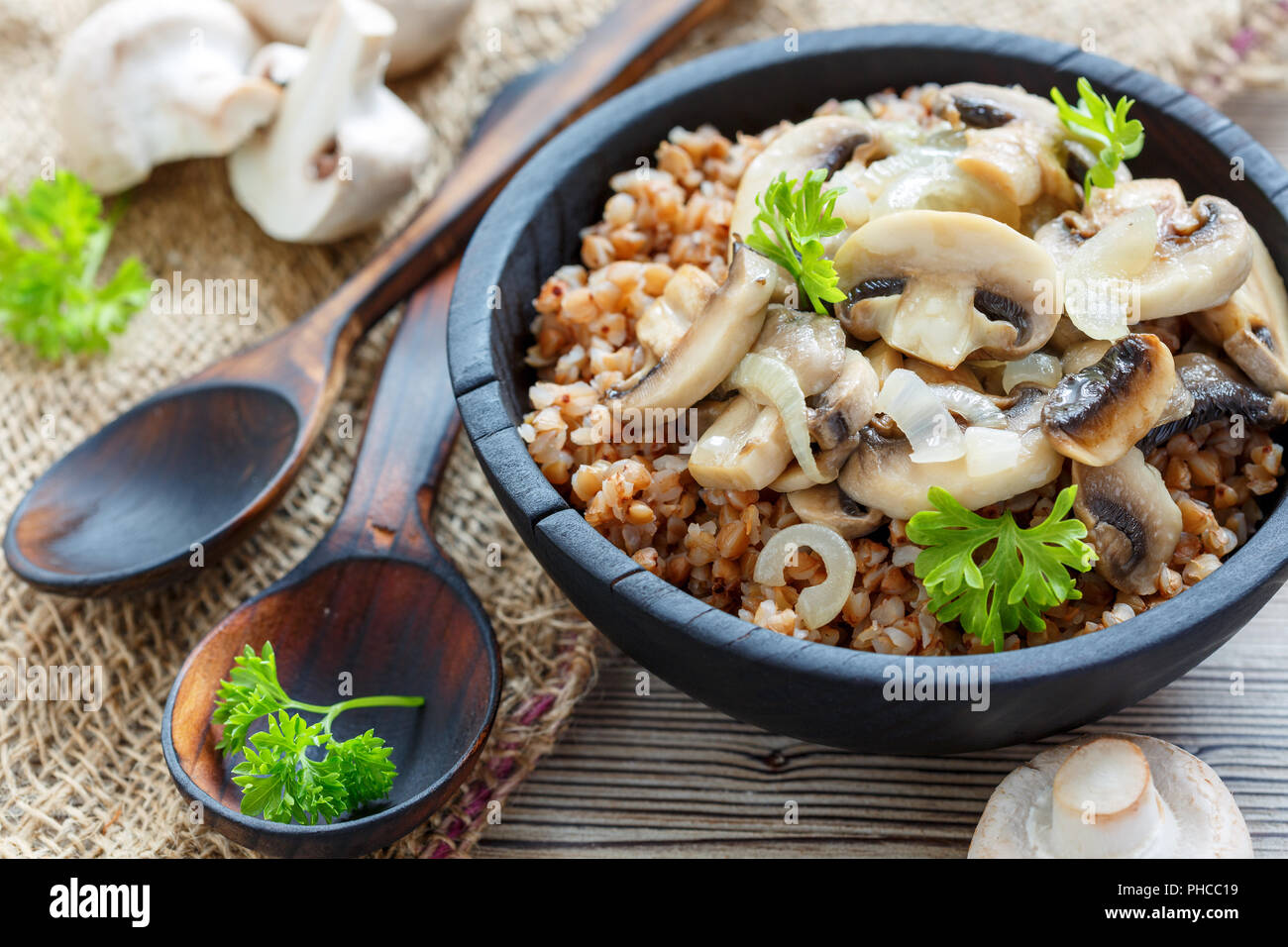 Delicious buckwheat with fried mushrooms and onions Stock Photo Alamy