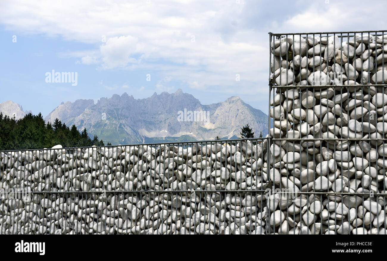 gabion with Kitzbuehler alps in the background Stock Photo