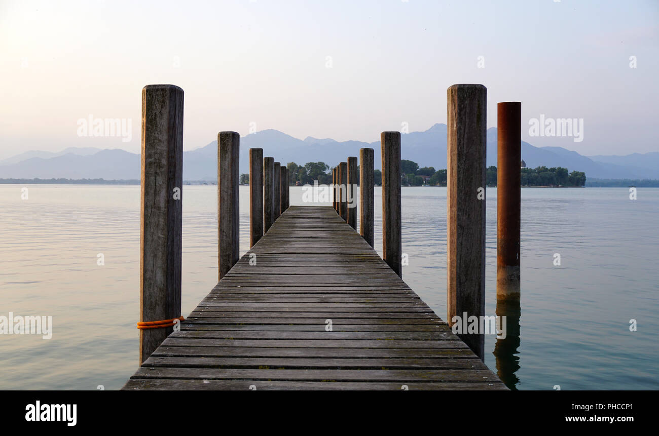 lonely landing stage with mountain at background Stock Photo