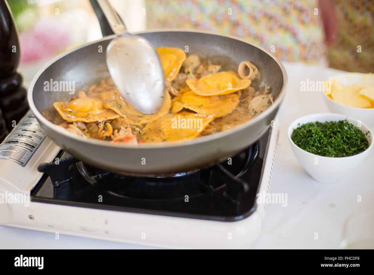Cooking a ravioli in restaurant at masterclass Stock Photo