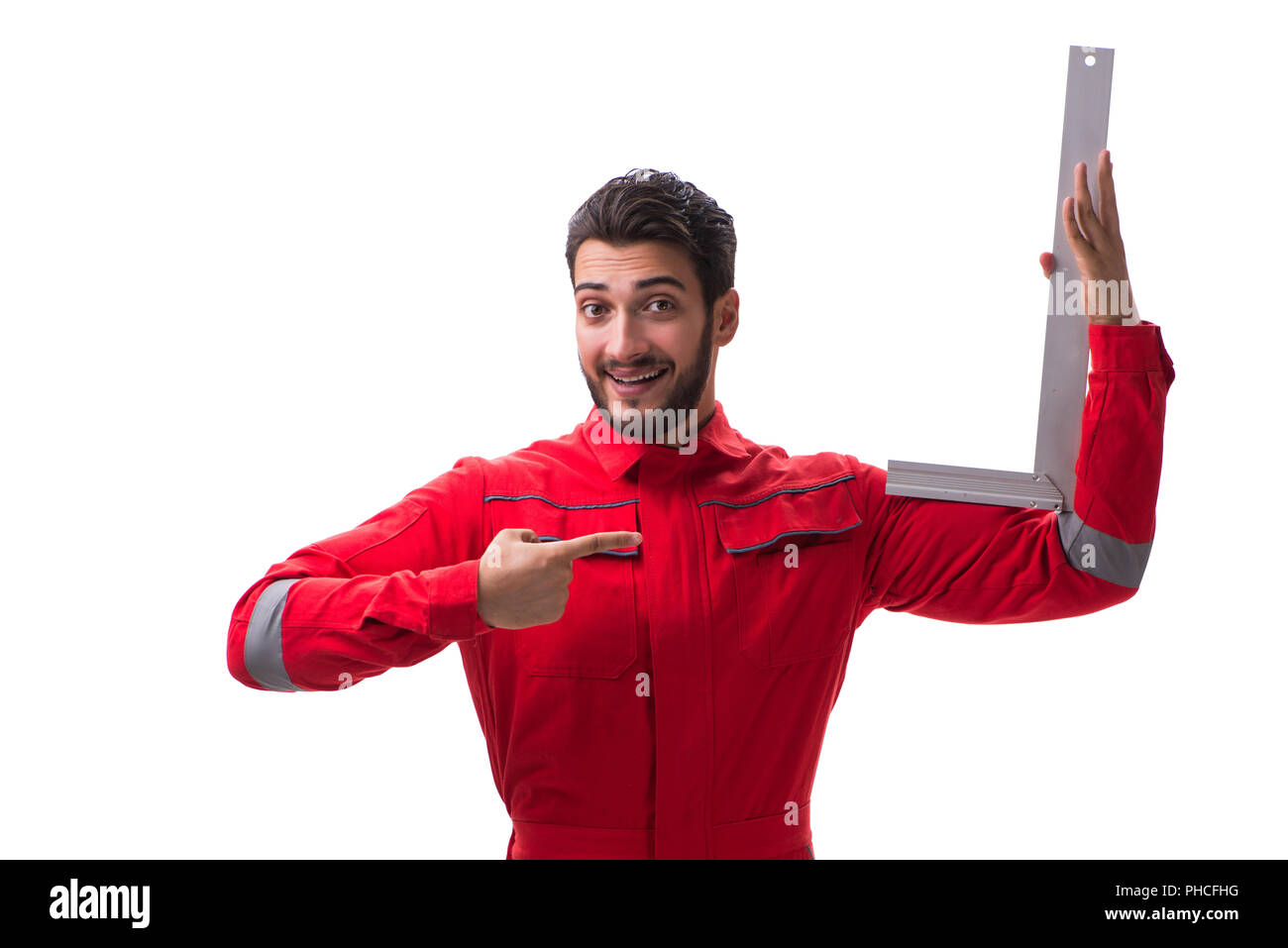 Young repairman with a square ruler isolated on white background Stock ...