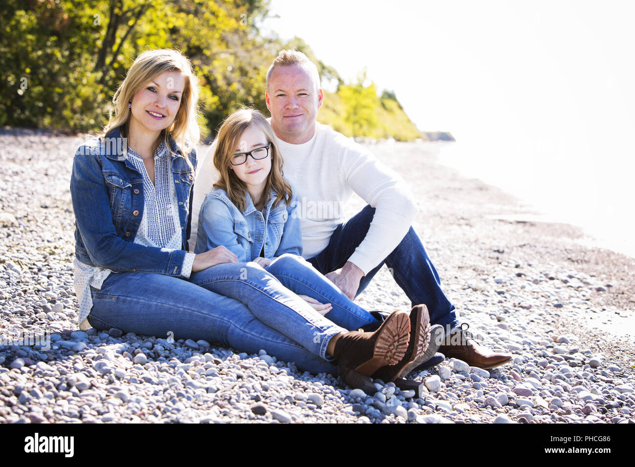 Family on the beach hi-res stock photography and images - Alamy