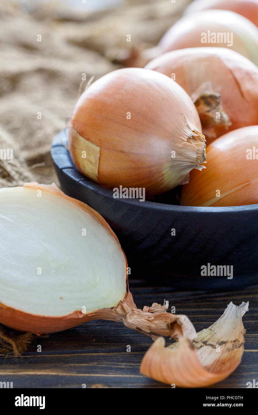 Yellow onion in the husk. Stock Photo