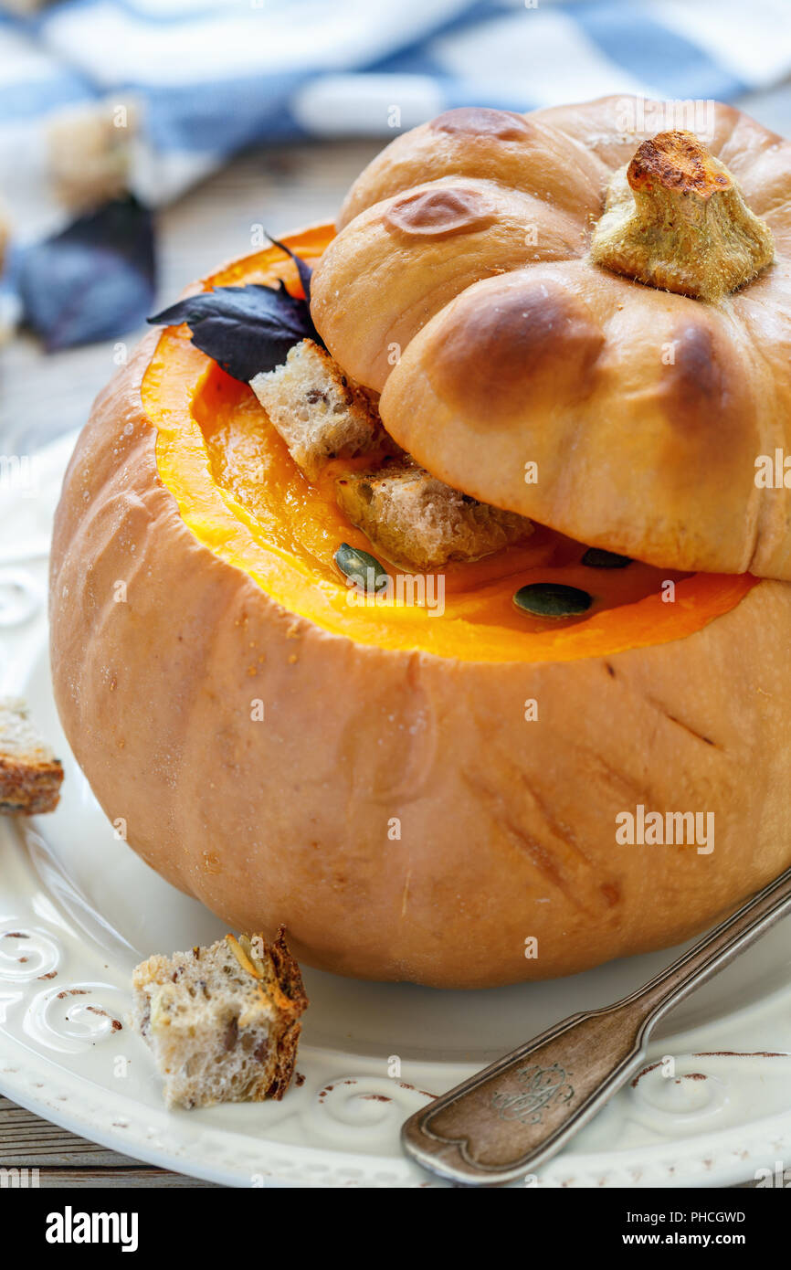 Pumpkin soup with croutons. Stock Photo