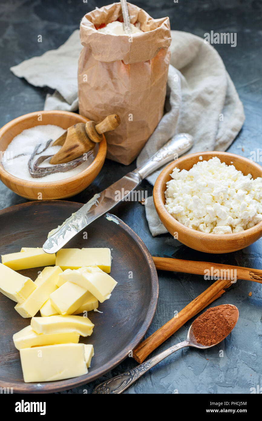Ingredients to bake cheese biscuits with cinnamon. Stock Photo