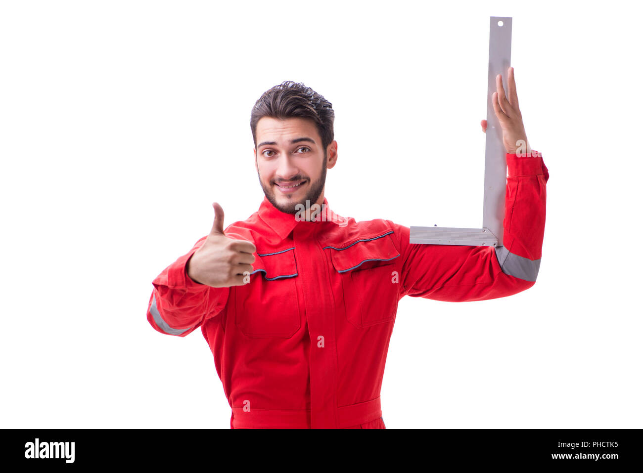 Young repairman with a square ruler isolated on white background Stock ...