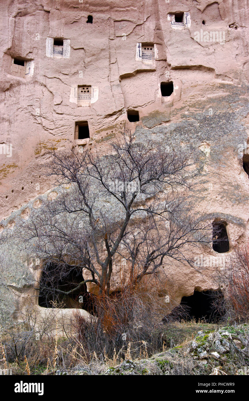Windows of houses built into cliffs in Zelve Open-air Museum, Cappadocia, Turkey Stock Photo
