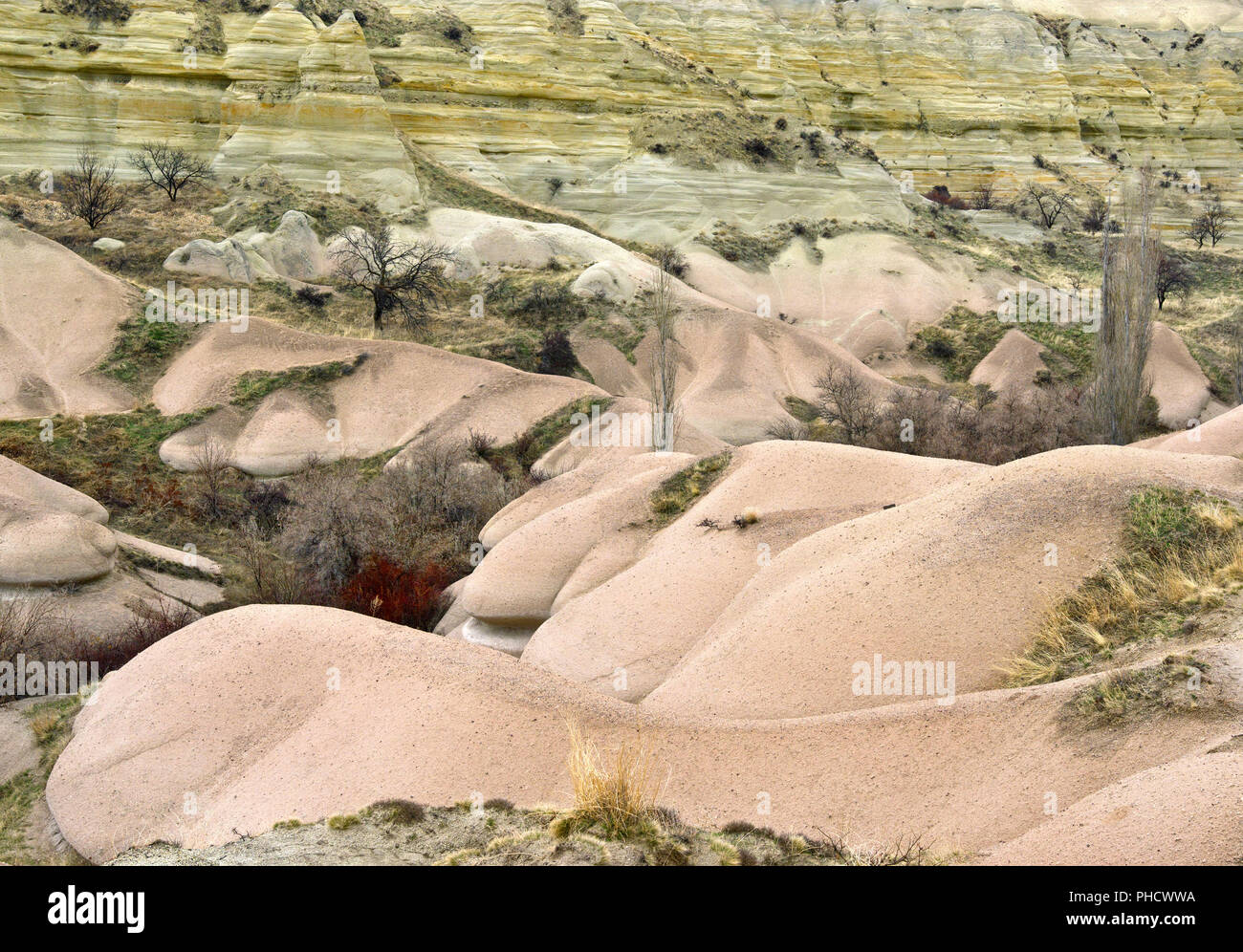 Pink and yellow stone in Love Valley, during winter, Cappadocia, Turkey Stock Photo