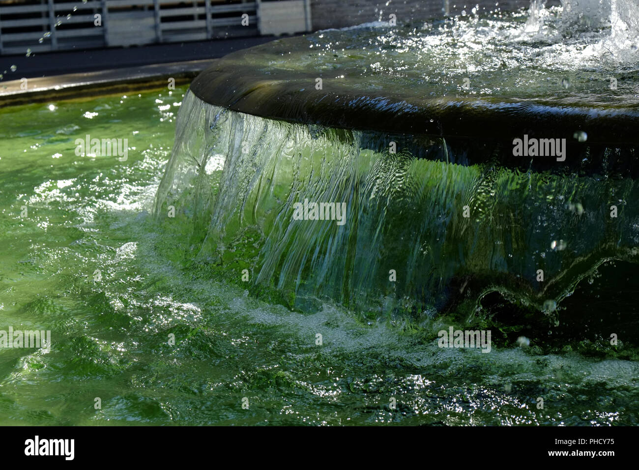 Fountain with flowing water Stock Photo Alamy