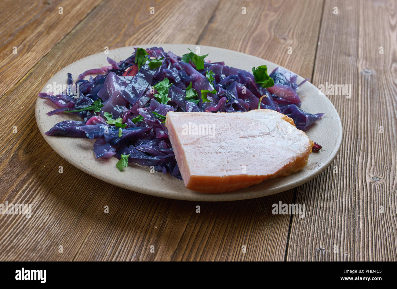Slowcooked pork red cabbage Stock Photo Alamy