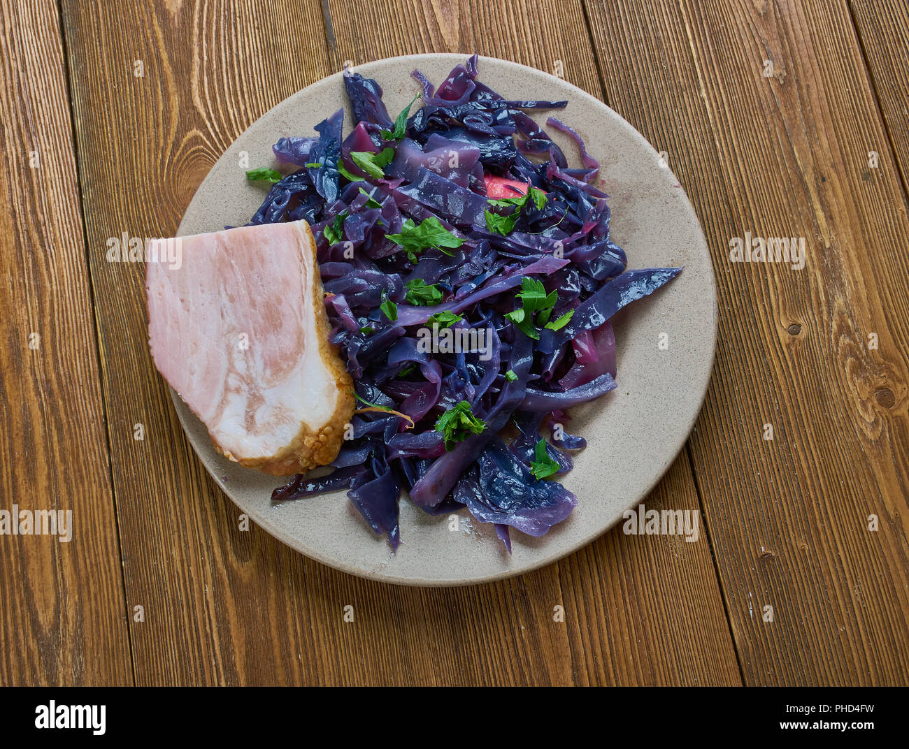 Slowcooked pork red cabbage Stock Photo Alamy