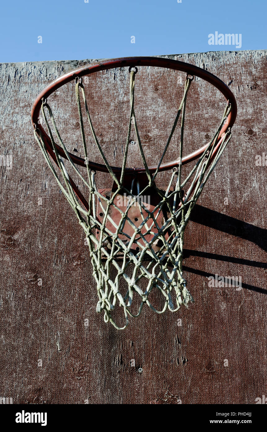 closeup of old basketball backboard and hoop outdoor Stock Photo